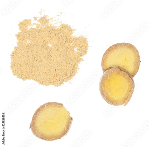 Ginger powder and ginger slices isolated on the white background, top view
