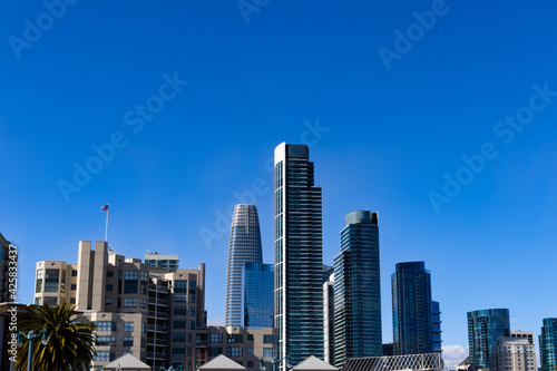 Dramatic San Francisco Bay Area California city skyline clear sky with skyscrapers