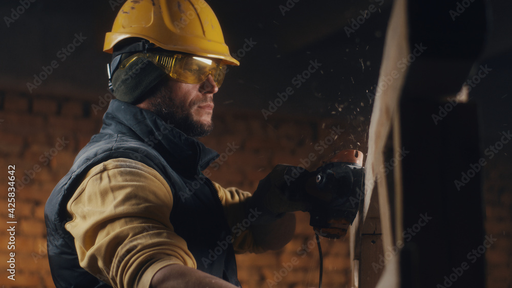 Male joiner shaping wooden structure Male joiner shaping wooden structure
