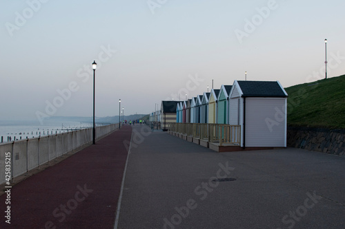 Beach huts on the beach at Gorleston in Norfolk, UK photo