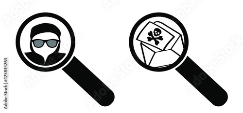 Magnifying glass. Computer crime. A hacker using computers, for stealing data. Online ransomware or malware to steal personal data from computer concept. No spam email.