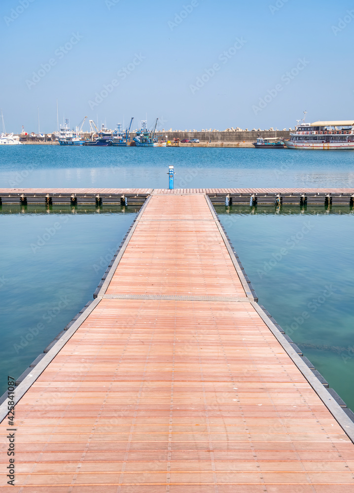 Fototapeta premium Pontoon bridge for boats at Turistic Port or harbor in Constanta, Romania .