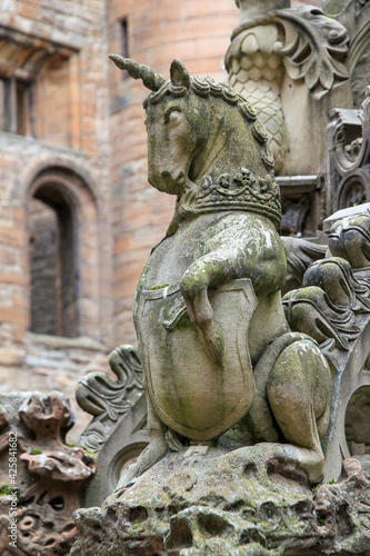 unicorn statue on castle fountain 