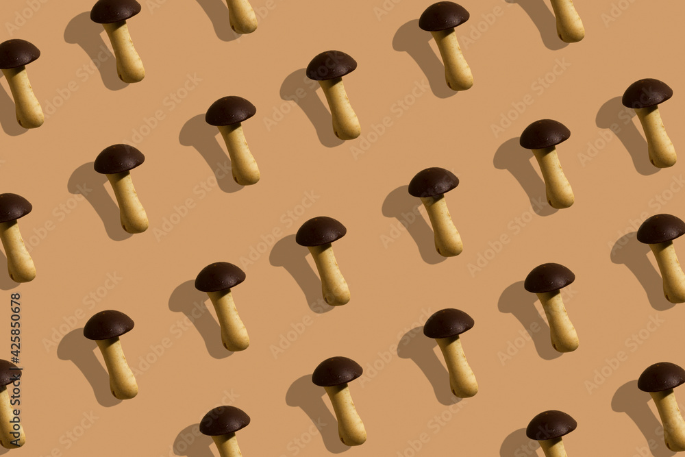 Mushroom cookies seamless pattern on a beige background. Minimalism background Mushroom cookies seamless pattern on a beige background. Minimalism background