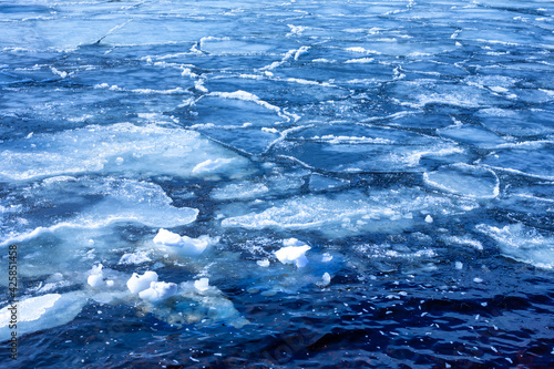 Ice drift on the lake. Spring ice melting.