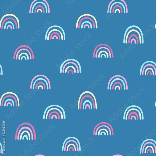 Colored baby seamless pattern with cute rainbows. Creative vector background for fabric, textile, baby wallpaper.
