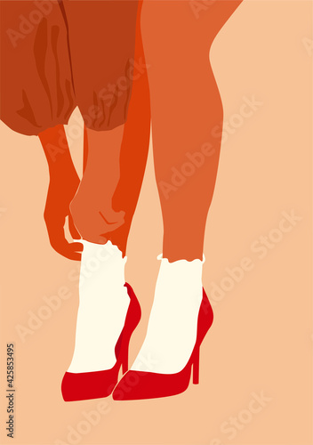 Girl in socks on heels. Long female legs. Female feet with socks in high heel shoes.