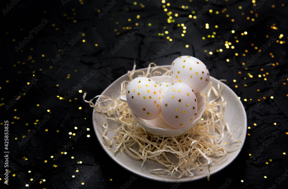 Fototapeta premium easter white eggs in a plate