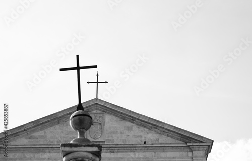 Cross on a roof at a Basilica in Rom