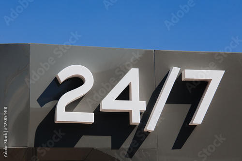 24 hrs 7 signboard. Open sign. Day and night working. 24 hour concept.