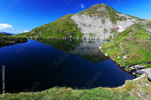 Fototapeta Naklejka Na Ścianę i Meble -  Capra lake in the Transylvanian Alps, Romania