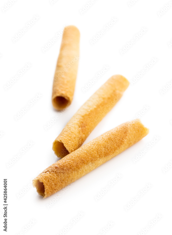 Sweet waffle tubes rolls isolated on white background. Sweet waffle tubes rolls isolated on white background.