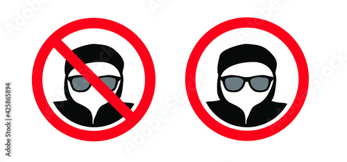 Stop, no balaclava sign. Computer crime. A hacker using computers, for stealing data. Online ransomware or malware to steal personal data from computer. Computer hacker, cyber security. 