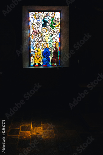 Mexico  Valle de Bravo March 26  2021  view of a stained glass window depicting a Catholic scene  it is seen illuminated by the sun and they are in the  Casa De Oraci  n Carmel Maranatha 