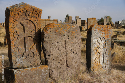 The ancient Noratus (Noraduz) Cemetery in Armenia, with lichen-encrusted khachkars (khatchkars, or cross-stones) photo