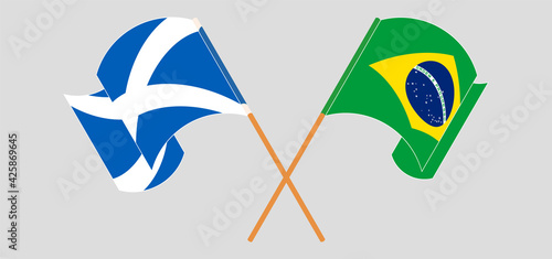 Crossed and waving flags of Brazil and Scotland