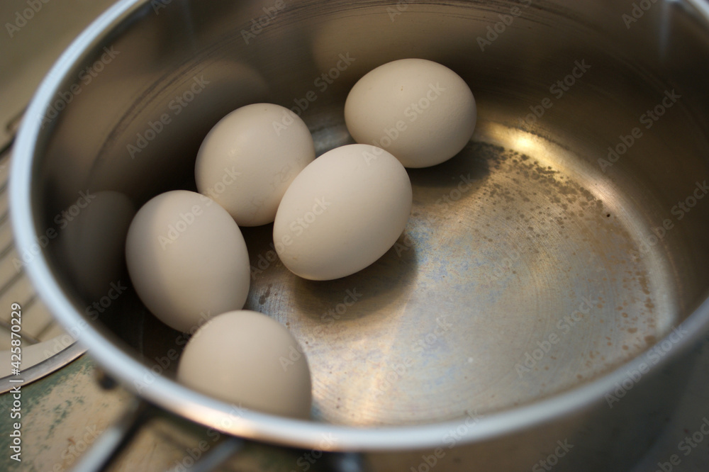 Eggs in pot ready to be cooked Eggs in pot ready to be cooked