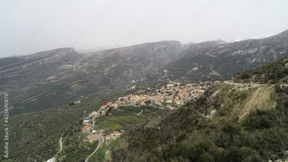 Beautiful village near the forest. Aerial footage of the city and the valley. The environment. Best hiking trails. Middle East region. Summer season in Lebanon. Mountain Road trip. Beautiful old town