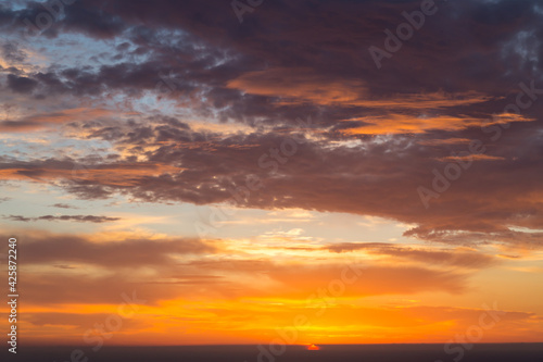 sunrise over the mediterranean sea and colorful clouds