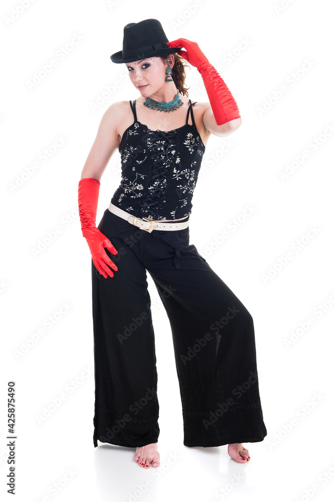 Female dancer in beautiful in black hat with black trousers and red gloves. Female dancer in beautiful in black hat with black trousers and red gloves.