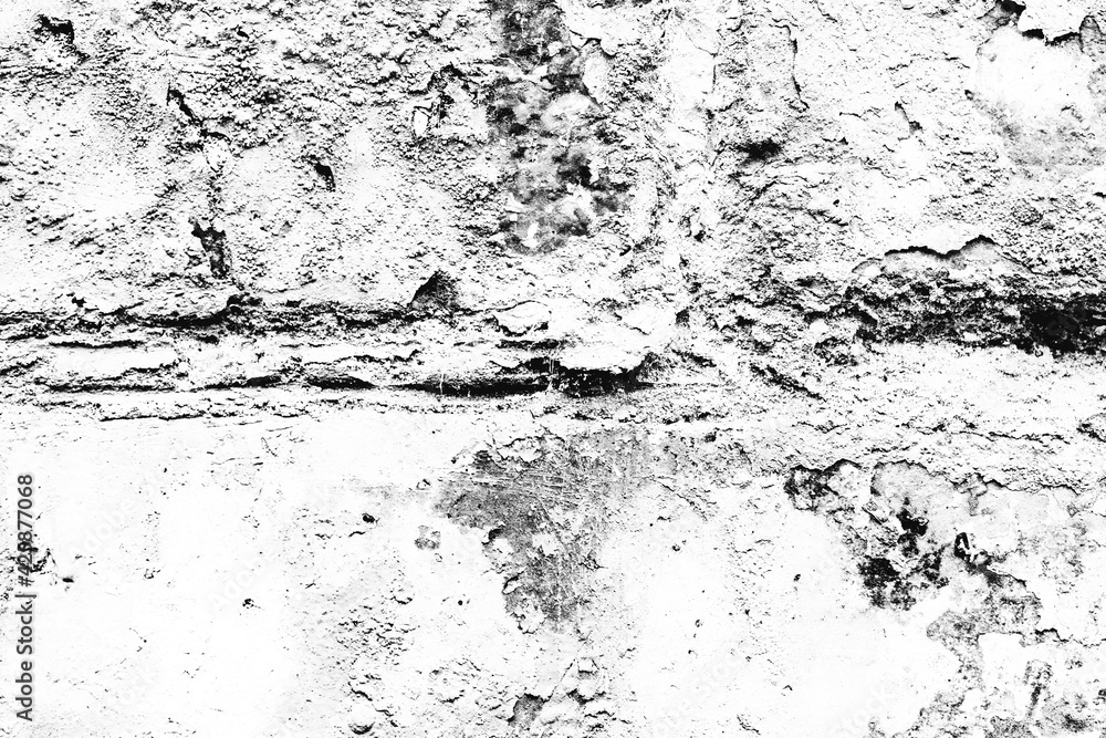 Obraz premium Texture of a brick wall with cracks and scratches which can be used as a background