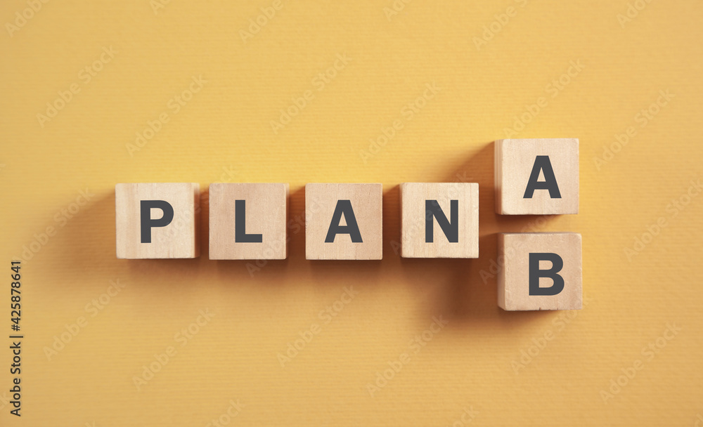 Obraz premium Plan A and Plan B on wooden cubes.