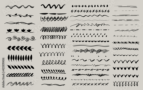 Collection of hand drawn brushes, ornament. Set of wavy horizontal lines. Marker hand-drawn line border set and scribble design elements. 