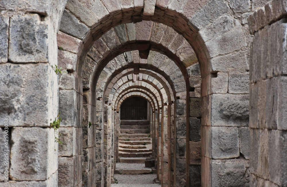 Pergamon, Turkey - a well preserved site from ancient Greek and Roman period, Pergamon is a Unesco World Heritage. Here in particular a glimpse of the archeological area . domed corridors and doors Pergamon, Turkey - a well preserved site from ancient Greek and Roman period, Pergamon is a Unesco World Heritage. Here in particular a glimpse of the archeological area . domed corridors and doors