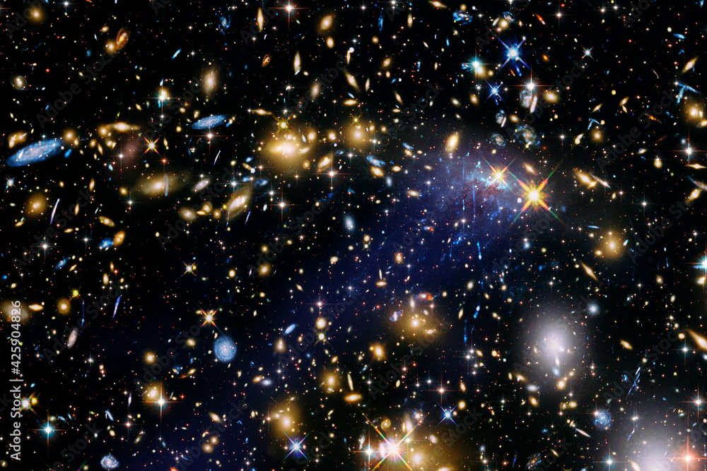 Colorful starry outer space background. The elements of this image furnished by NASA. Colorful starry outer space background. The elements of this image furnished by NASA.