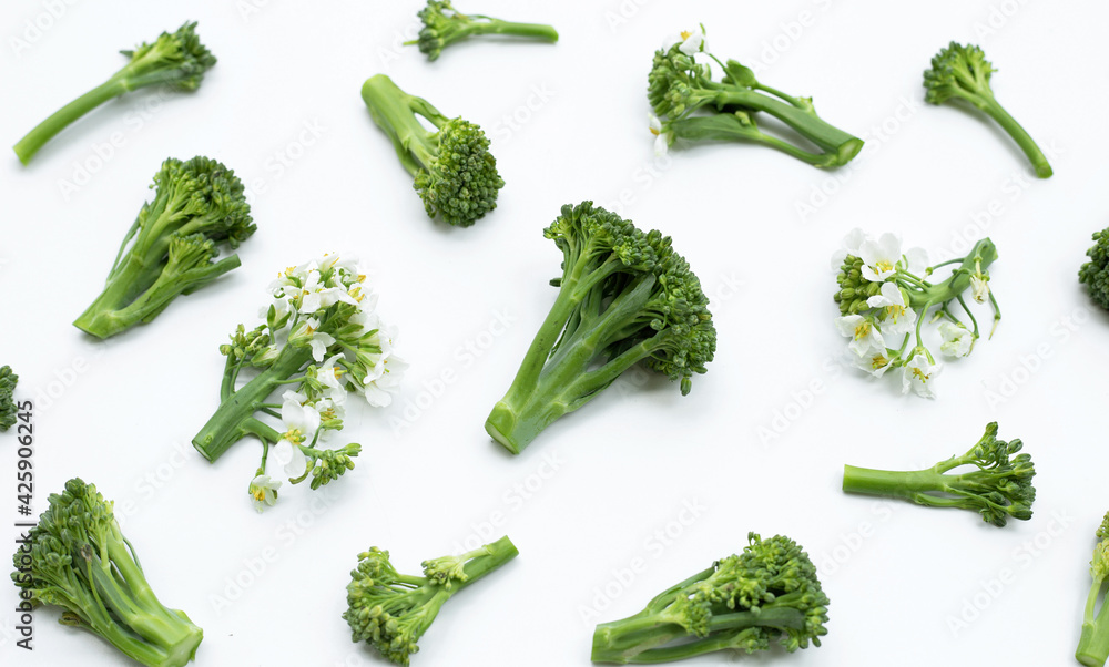 Green baby broccoli with chinese kale flower on white background. Green baby broccoli with chinese kale flower on white background.