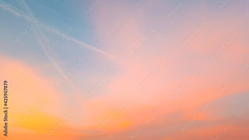 Abstract beautiful summer sunrise or sunset sky background in pastel tones. Colorful natural backdrop.