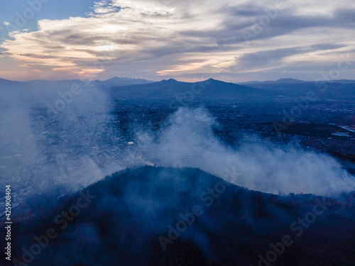 mountain in the smoke of a fire, global warming concept