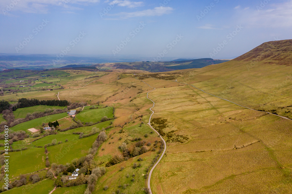 Aerial view of rural Welsh countryside and farms (Hay Bluff, Wales/England)