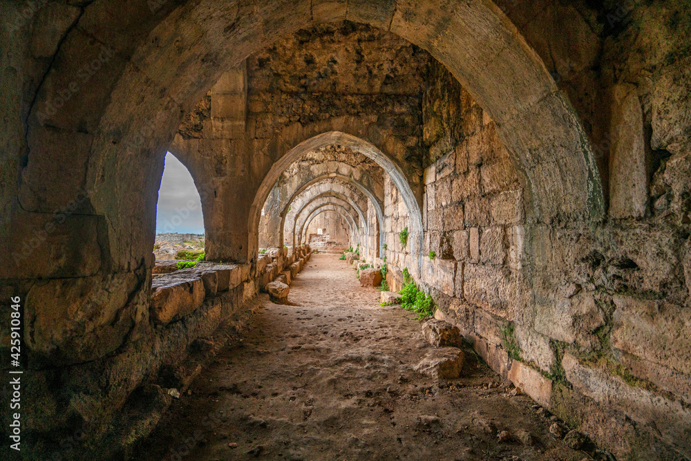 Fototapeta premium Evdir Han is an impressive and colossal han with a plan unlike any other han in Anatolia, and located in a setting of stunning beauty and history, located 18 km from Antalya