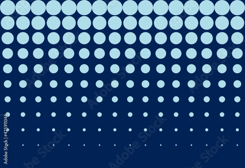 Patrón de esferas crecientes en color azul claro sobre fondo azul oscuro ordenadas verticalmente