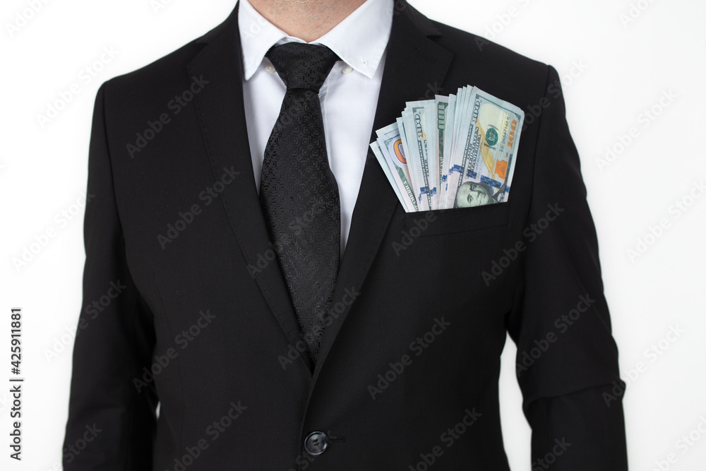 Businessman in suit jacket with money in his pocket. new 100 american dollars.
Businessman in suit jacket with money in his pocket. new 100 american dollars.
