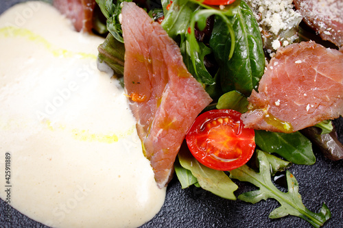 Restaurant menu, roast beef and vegetable salad