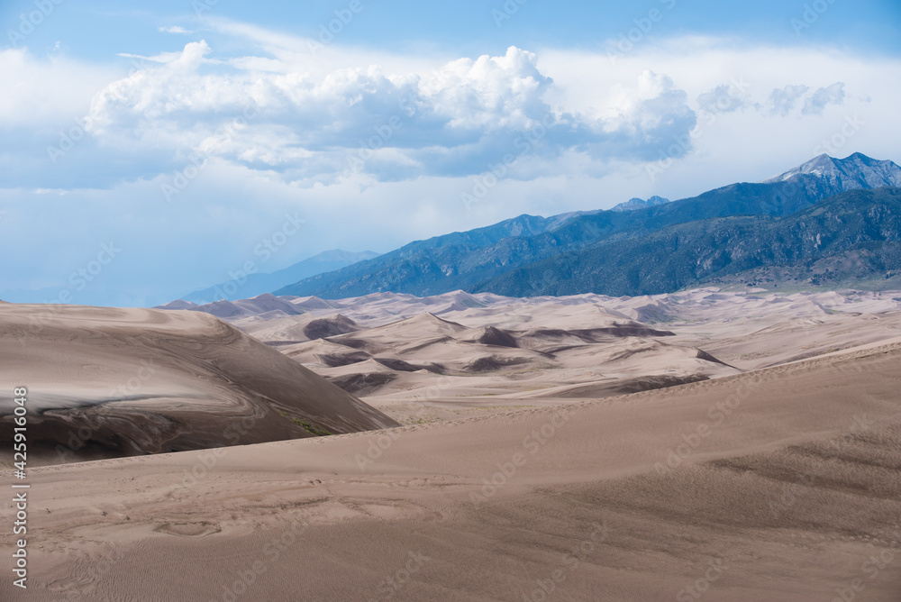 sand dunes and mountains in Colorado.