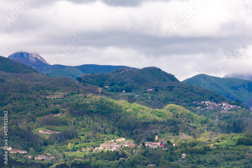 Spring in the Tuscan mountains. Villages and towns in the Italian Mountains. Panorama of old stone settlements.