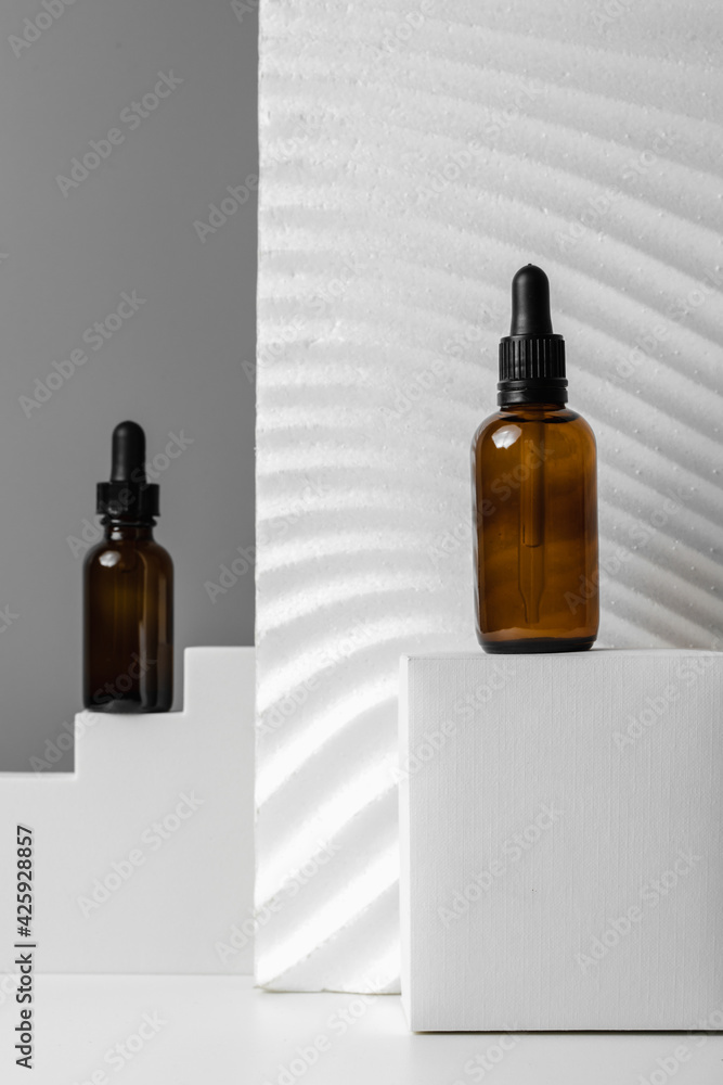 Serum for face. Skincare routine step for healthy skin. Essence for Healthy Skin. Filler for wrinkles. Hyaluronic acid, skin hydration, bottle drops. Beauty and cosmetic concept. Copy space. Serum for face. Skincare routine step for healthy skin. Essence for Healthy Skin. Filler for wrinkles. Hyaluronic acid, skin hydration, bottle drops. Beauty and cosmetic concept. Copy space.