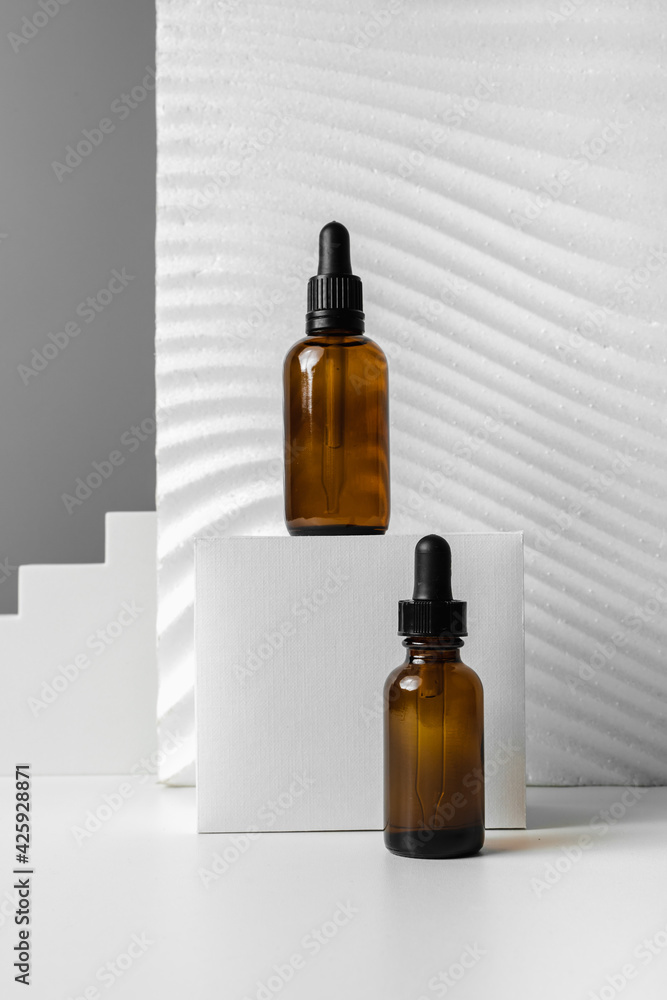 Serum for face. Skincare routine step for healthy skin. Essence for Healthy Skin. Filler for wrinkles. Hyaluronic acid, skin hydration, bottle drops. Beauty and cosmetic concept. Copy space. Serum for face. Skincare routine step for healthy skin. Essence for Healthy Skin. Filler for wrinkles. Hyaluronic acid, skin hydration, bottle drops. Beauty and cosmetic concept. Copy space.