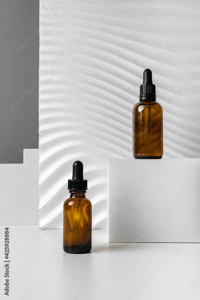 Serum for face. Skincare routine step for healthy skin. Essence for Healthy Skin. Filler for wrinkles. Hyaluronic acid, skin hydration, bottle drops. Beauty and cosmetic concept. Copy space. Serum for face. Skincare routine step for healthy skin. Essence for Healthy Skin. Filler for wrinkles. Hyaluronic acid, skin hydration, bottle drops. Beauty and cosmetic concept. Copy space.