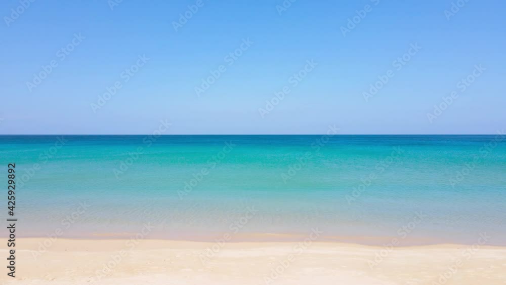 Aerial view in perspective of drone. Phuket beach sea sand and sky. Landscape view of beach sea in summer day. Beach space area. At Karon Beach, Phuket, Thailand. On 6 April 2021. 4K UHD. Video Clip Aerial view in perspective of drone. Phuket beach sea sand and sky. Landscape view of beach sea in summer day. Beach space area. At Karon Beach, Phuket, Thailand. On 6 April 2021. 4K UHD. Video Clip