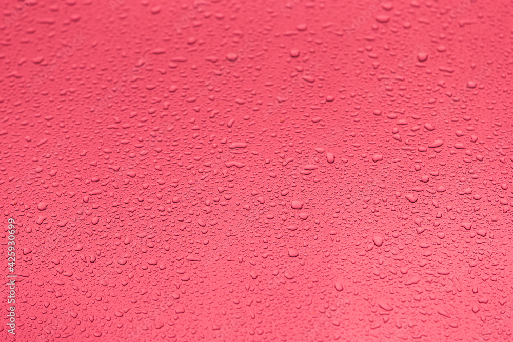 pink water drops on a window pink water drops on a window