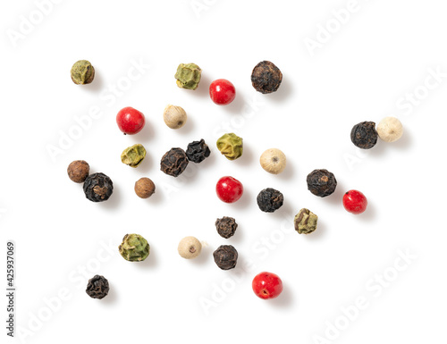 Pepper mix. Black, red, white, and green peppercorn on a white background.