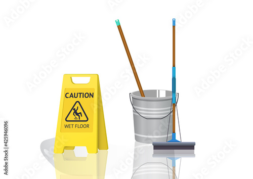 wet floor sign and bucket of water