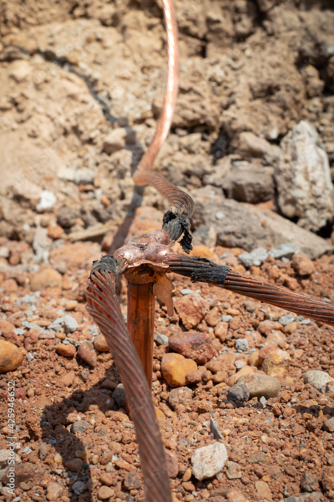 Welding copper ground wire on ground rod.Welding copper ground wire.Connect copper grounding