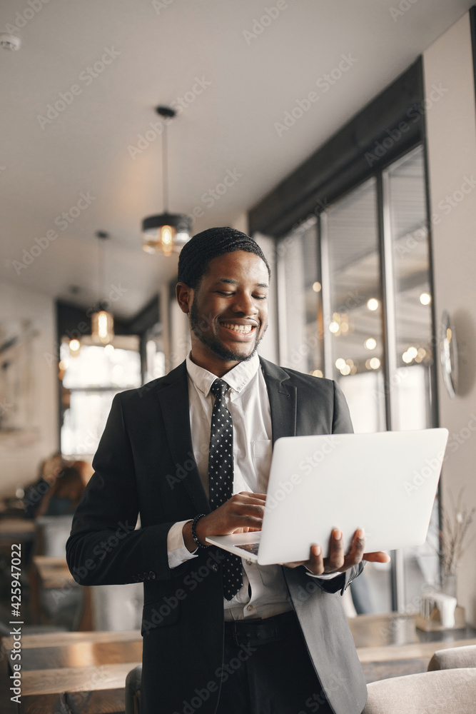 Fototapeta premium Elegant african man in the office