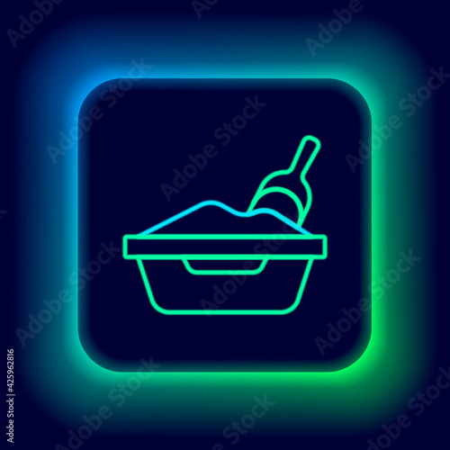 Glowing neon line Cat litter tray with shovel icon isolated on black background. Sandbox cat with shovel. Colorful outline concept. Vector