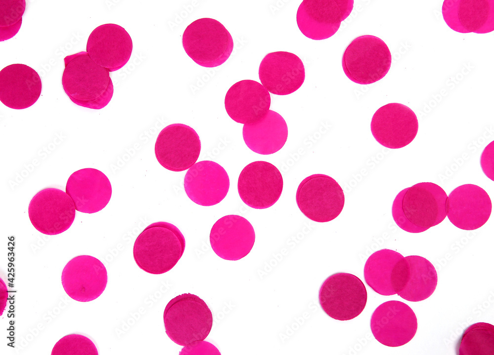 colored round confetti on white background